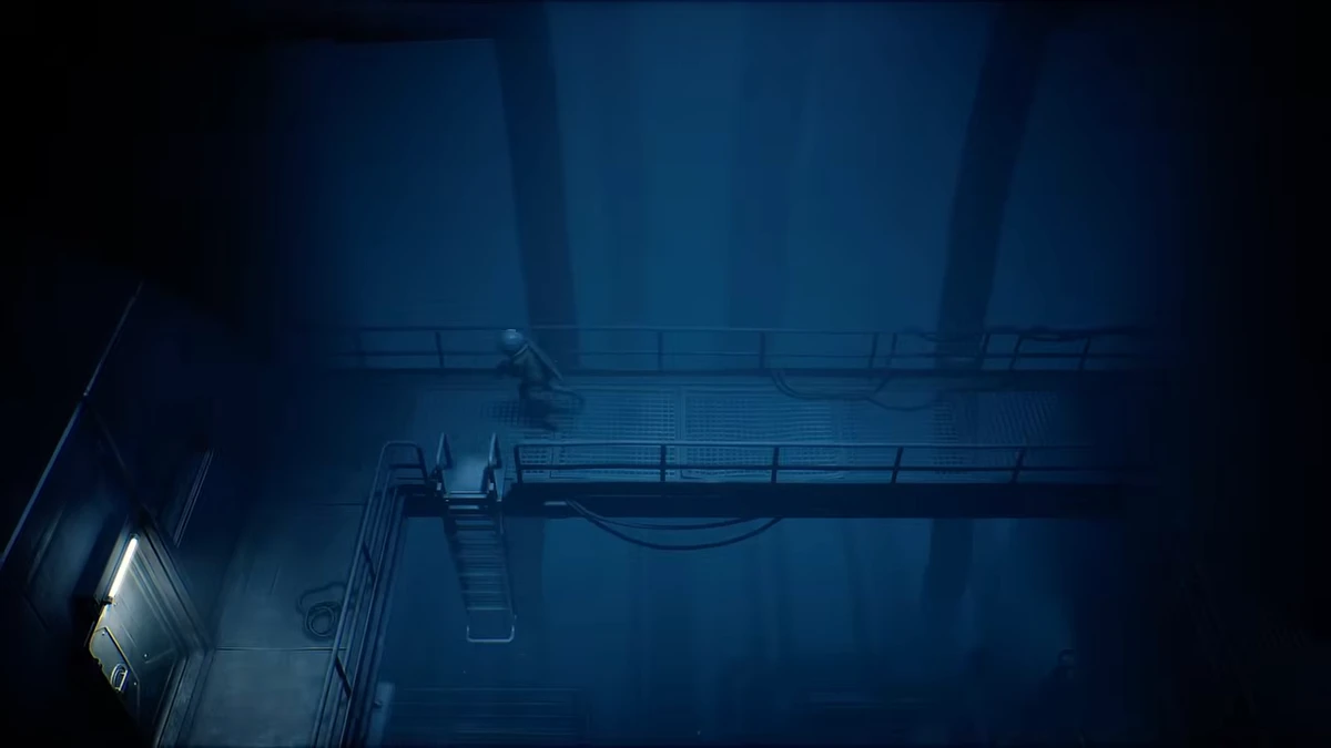 Cel crossing a catwalk deep inside the facility — gameplay capture